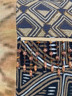 Beaded Pillow with Dark Tones and IKAT print with Saddle Leather Back