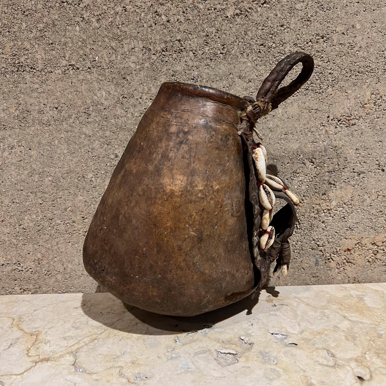 Decorative Tribal Vessel African Leather Milk Jug 2
8 h x 5 d x 7 w
Original vintage condition
Refer to images listed