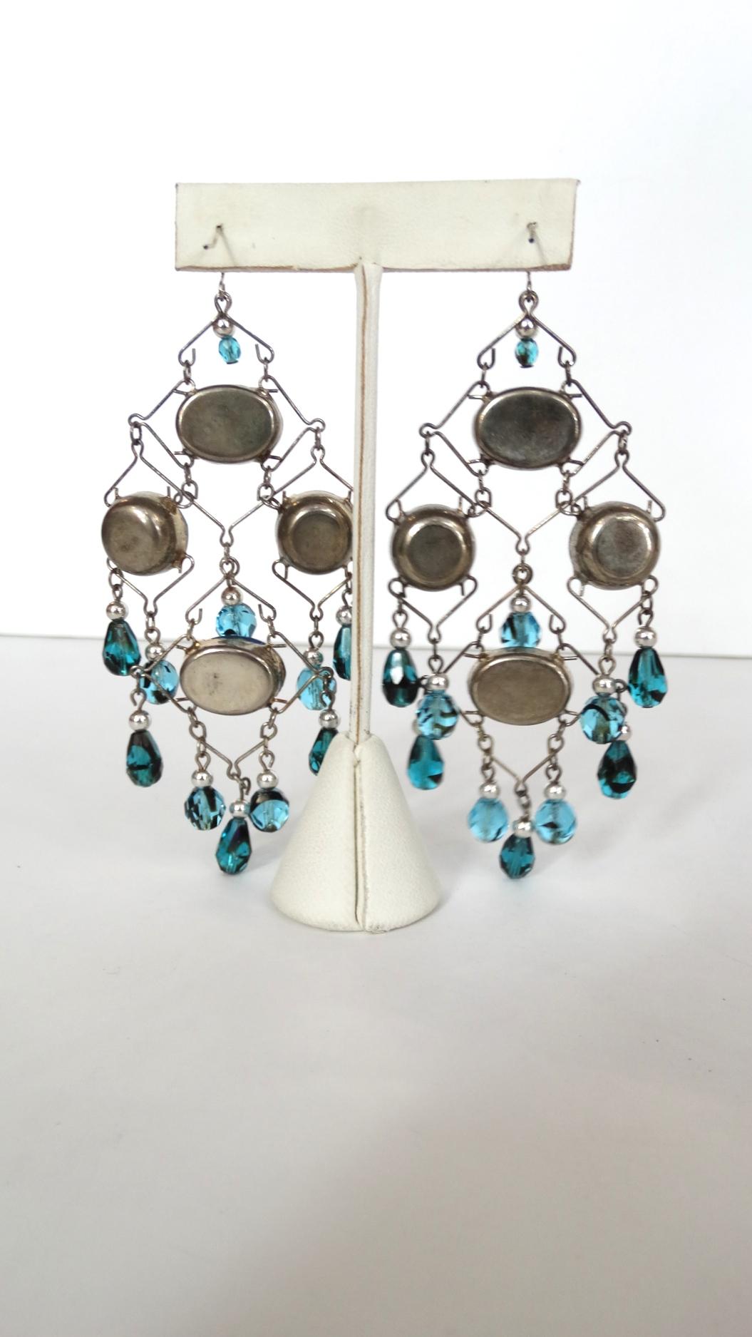 Add These Amazing Earrings To Your Collection! Circa 21st Century, these dangle earrings are constructed of a wire setting. Features faux Aquamarine gemstones and beads that hang from the base. Includes pierced fish hook backs. Drops 4 inches 