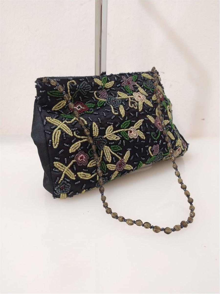Textile Black color Mix of multicolored beads/corals Zip closure Can be worn on shoulder too Cm 24 x 17 (9.44 x 6.69 inches)
