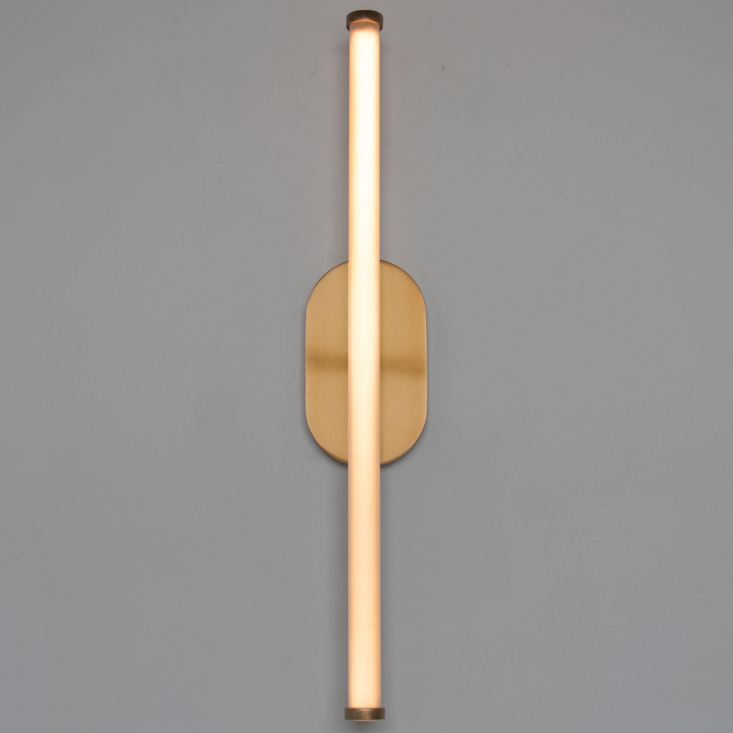 The BEAM Wall Sconce is built from cold-rolled steel, and is diffused by a minimal frosted, 1