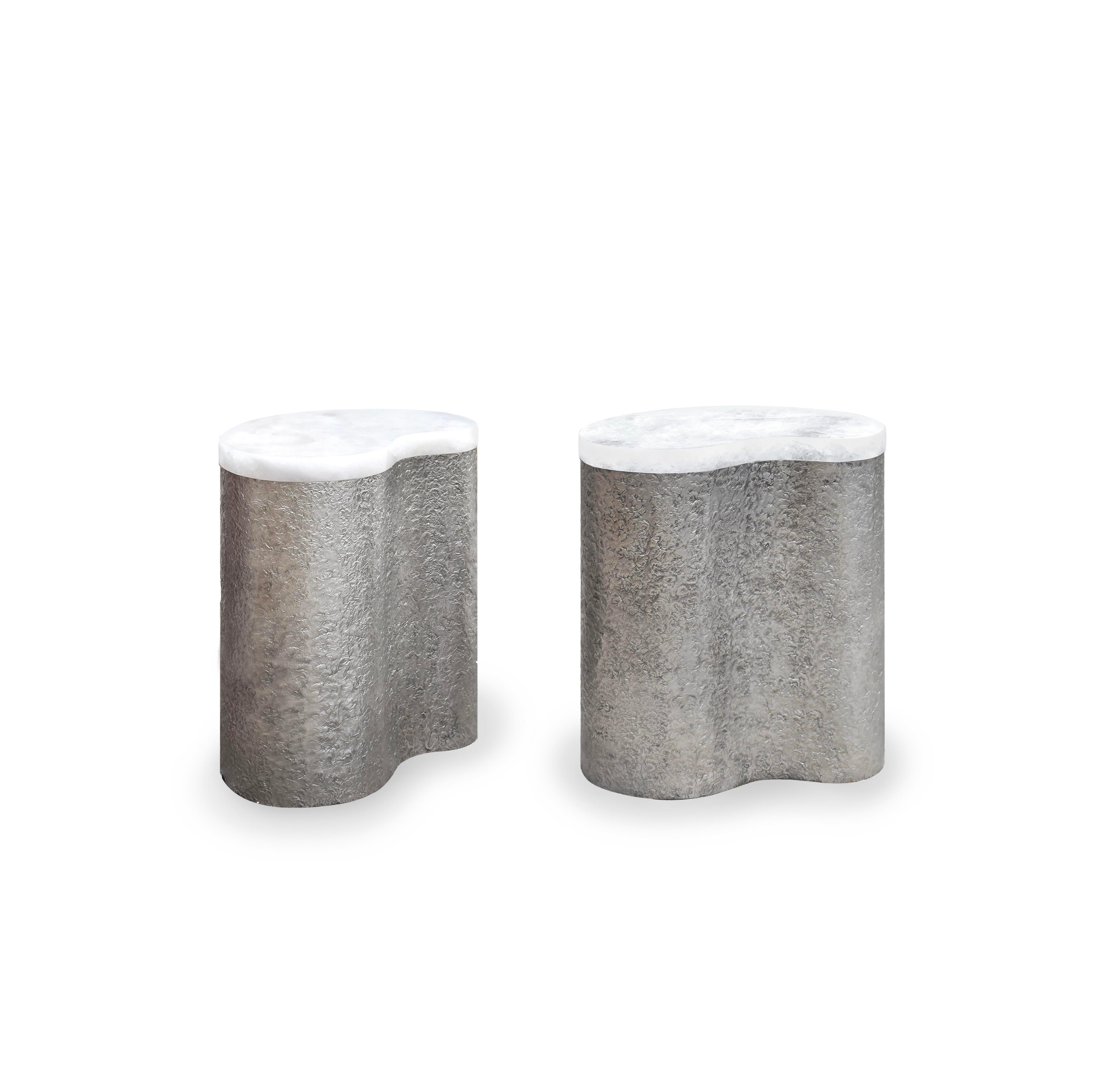 Pair of hammered matte nickel finish side tables with rock crystal quartz tops, created by Phoenix Gallery NYC.
Custom size and metal finish upon request.