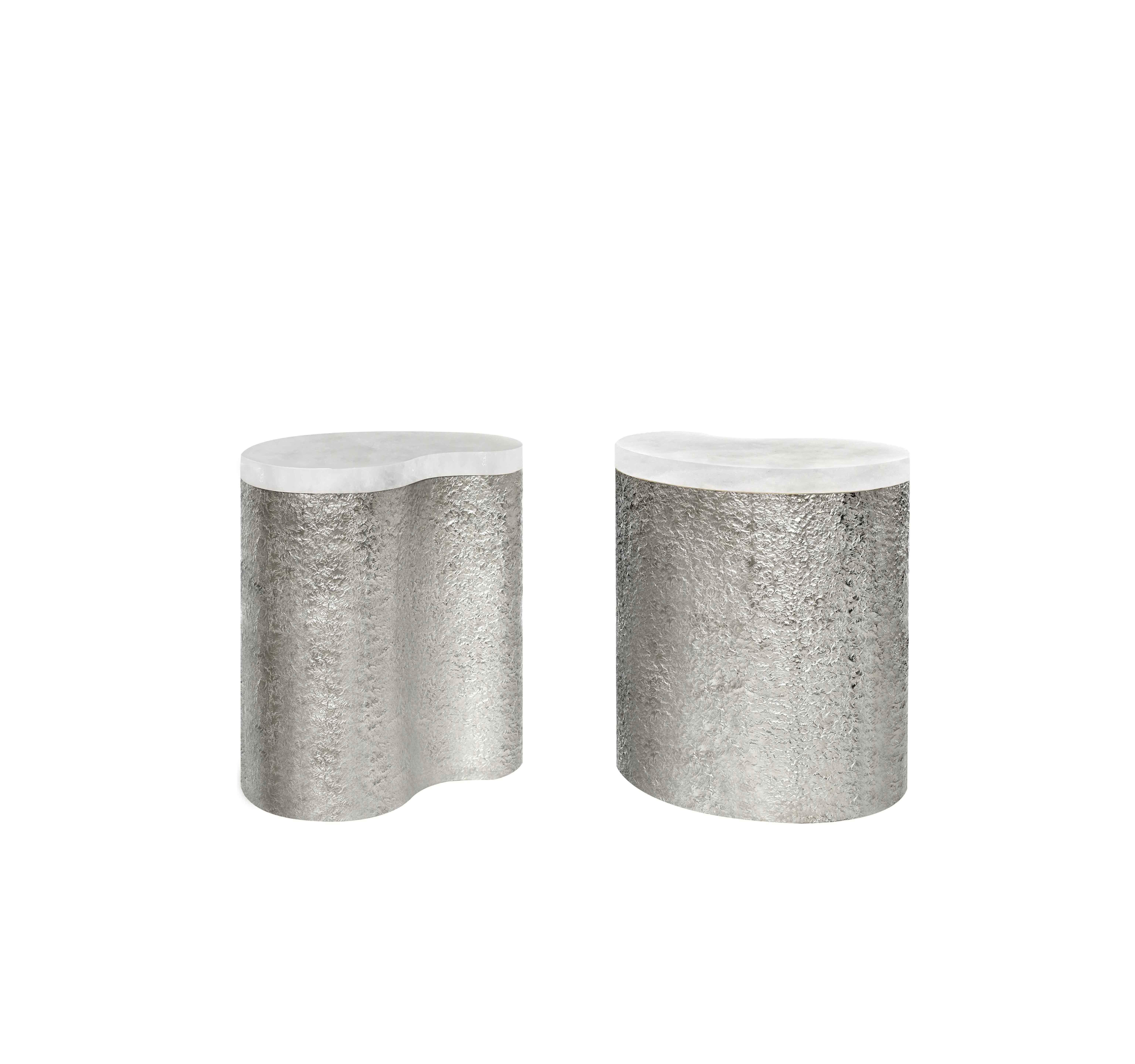 Pair of hammered nickel finish side tables with rock crystal quartz tops, created by Phoenix Gallery NYC.
Custom size and metal finish upon request.