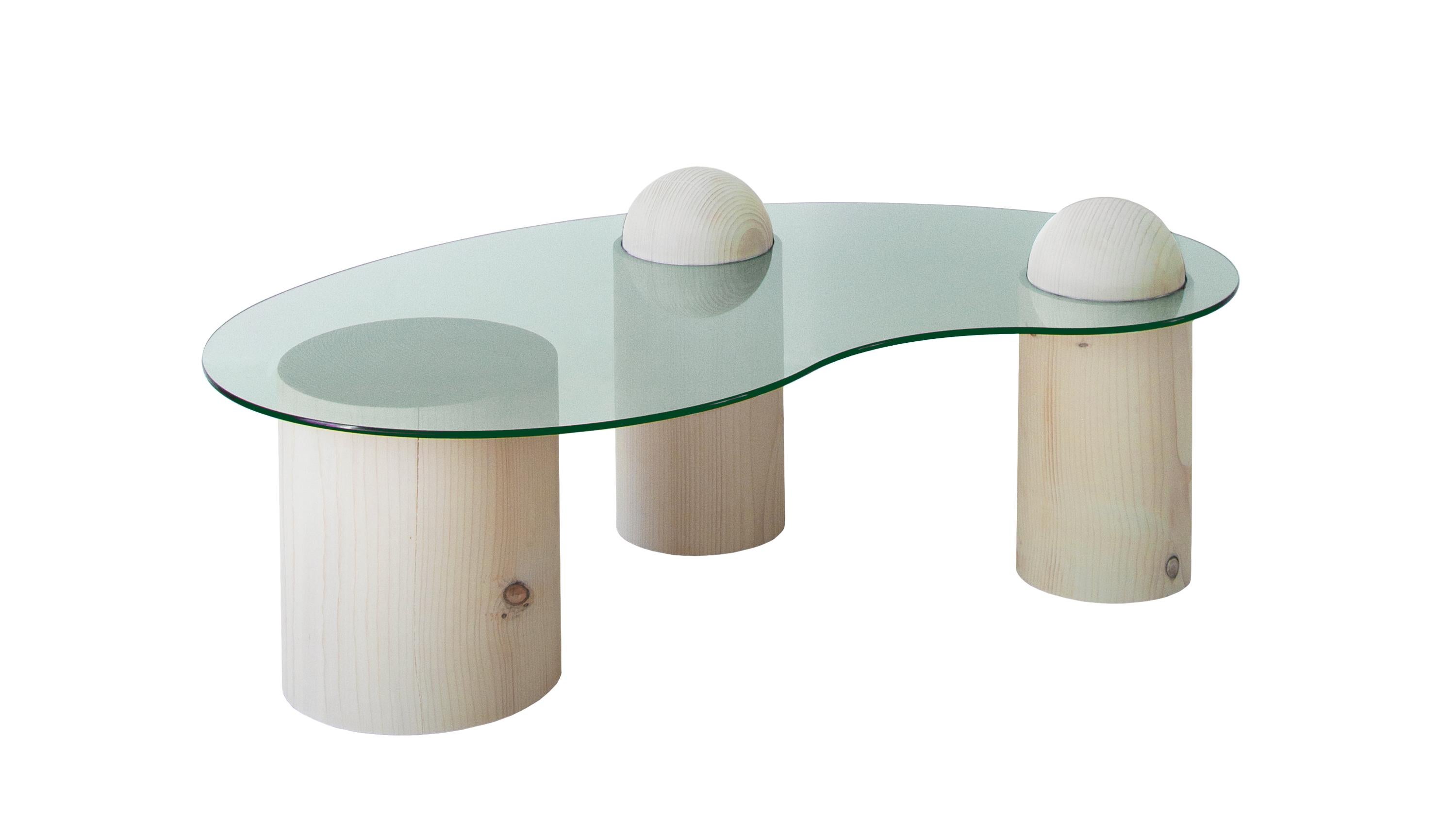 Jonas Coffee Table by LI-AN-LO Studio
Dimensions: D 70 x W 120 x 44 cm.
Materials: Spruce and clear tempered glass.

Clear or bronze coloured glass top options available. Please contact us.

The Bean Coffee Table imitates the natures force of