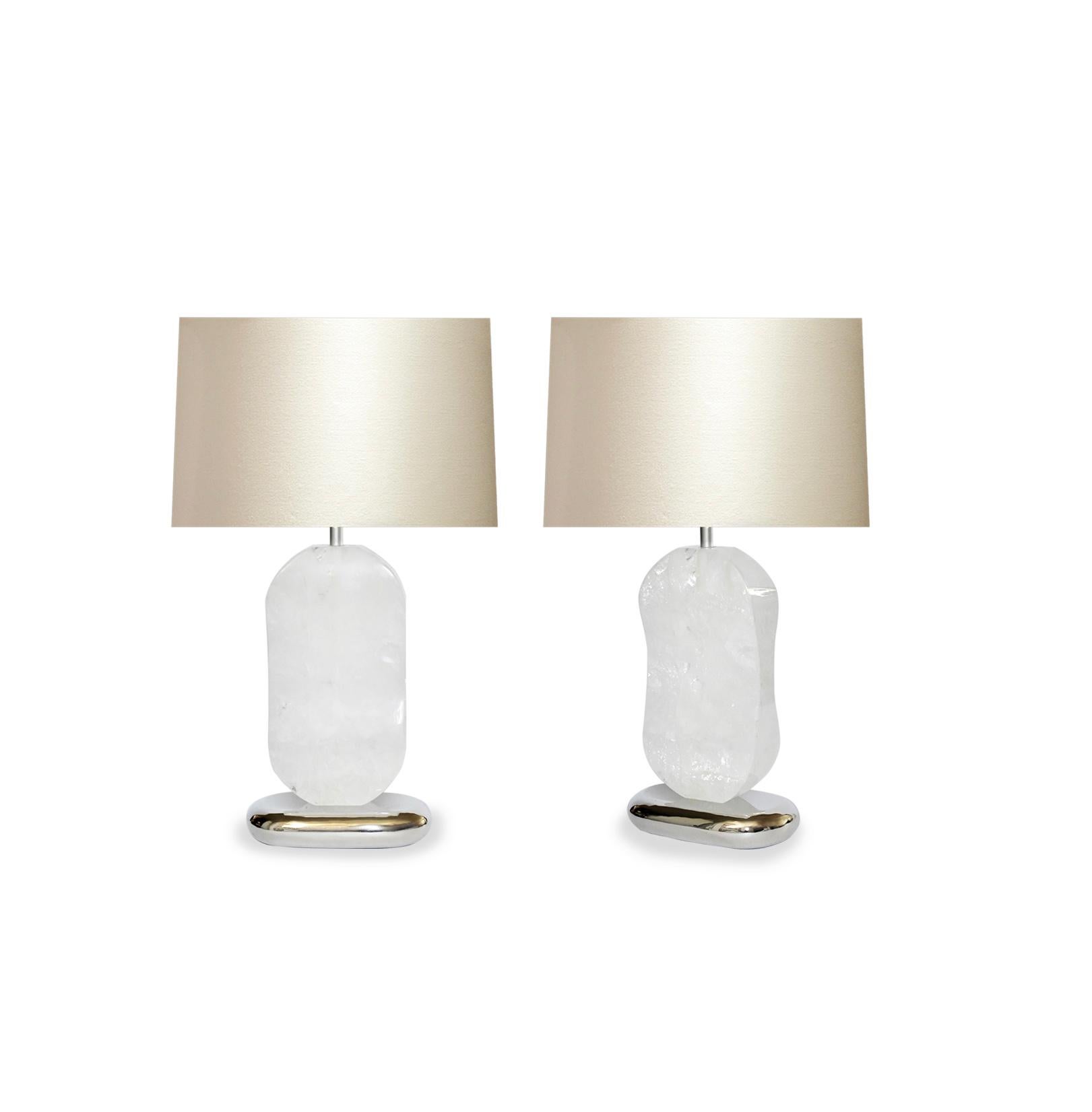 Pair of carved oval form rock crystal quartz lamp with nickel plating bases. Created by Phoenix Gallery, NYC.
Measure: To the top of rock crystal: 14.35