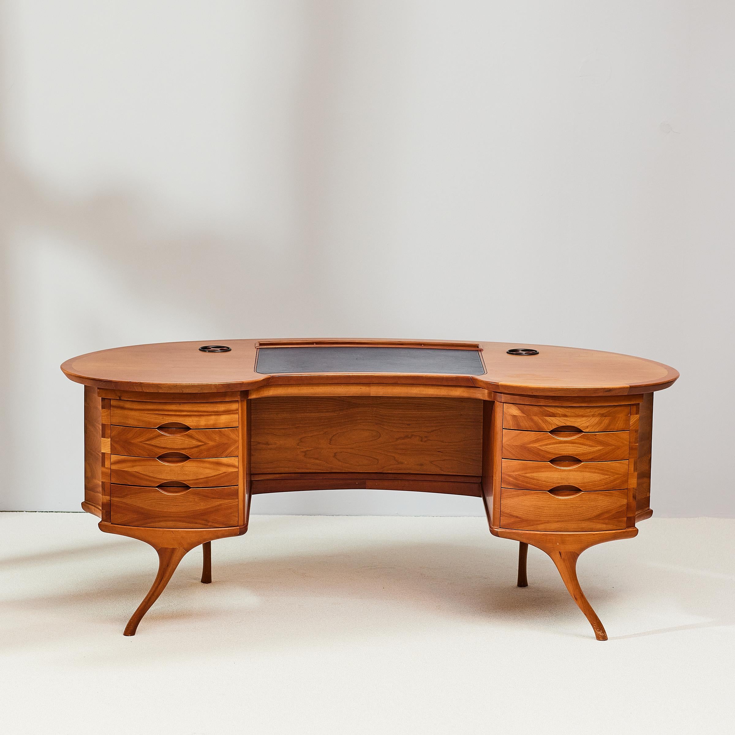 The Bean desk was designed by Roberto Lazzeroni for Ceccotti Collezzioni in 1990. It’s organic bean shape makes it extra comfortable with much surface space on both sides.