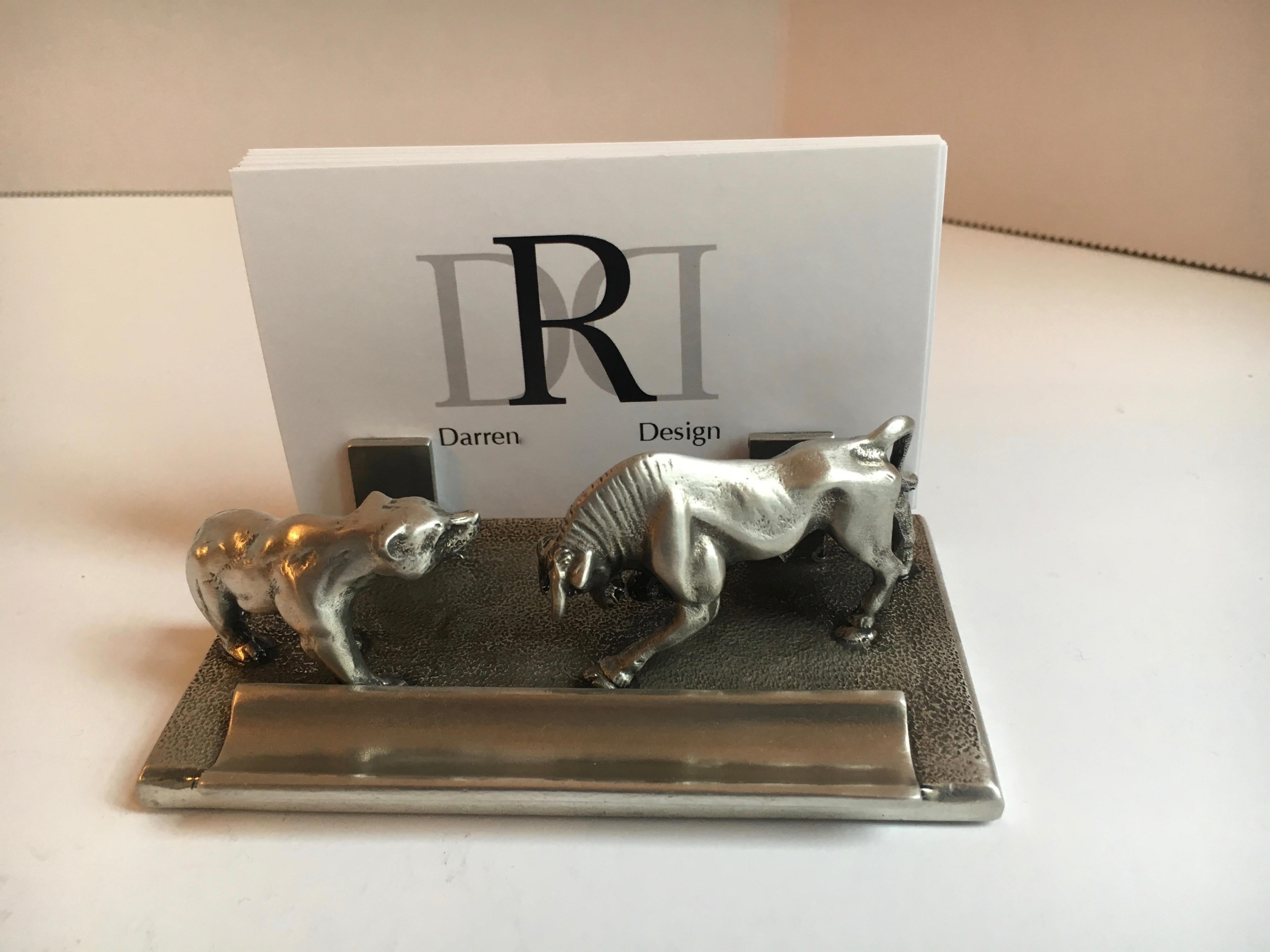 Bear and bull pen business card pen holder - inspired by Spanish California's bull and bear fights, this pen holder features the two fierce opponents engaged in battle. Crafted from solid pewter, they are frozen in time in full fight stance, the