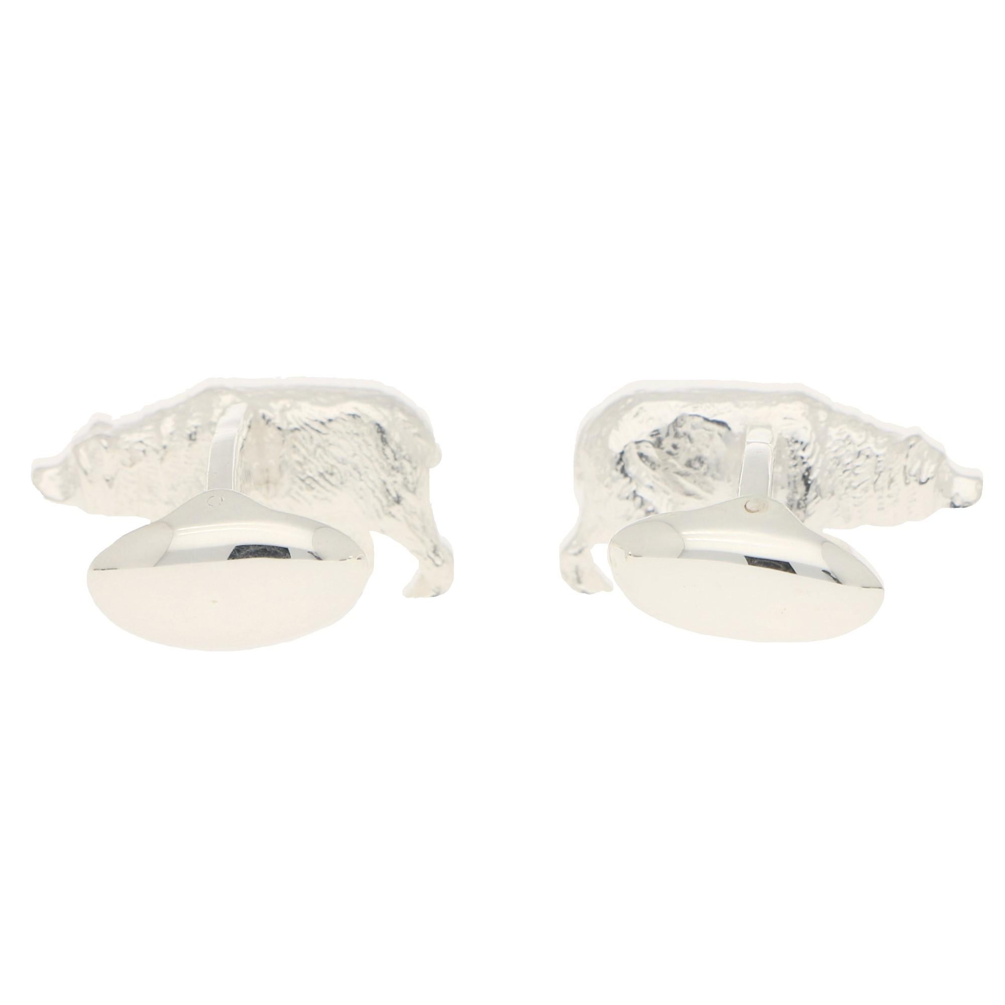 A beautifully detailed pair of bear swivel back cufflinks in solid sterling silver.

Each cufflink depicts a walking bear both going in opposite directions.The bears have been hand crafted and are each individually detailed to highlight the face and