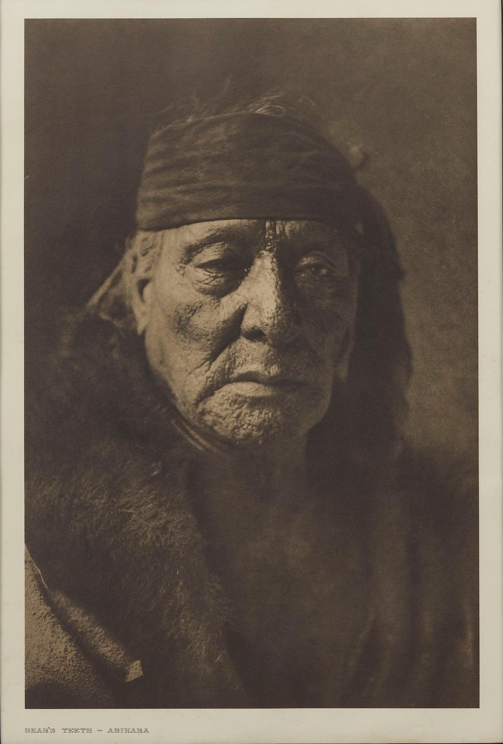 Presented is a fine photogravure portrait of Bear’s Teeth of the Arikara tribe by Edward Curtis. The image is Plate 154 from Supplementary Portfolio 5 of Edward Curtis' epic project The North American Indian. The caption, written by Curtis, for this