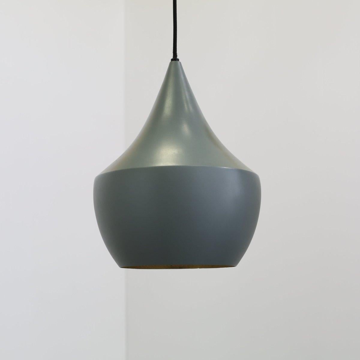 Introducing the Beat Fat Pendant Light by renowned designer Tom Dixon. This stunning piece features a sleek and modern design, perfect for adding a touch of luxury to any space. Crafted from high-quality materials, the Beat Fat Pendant Light boasts