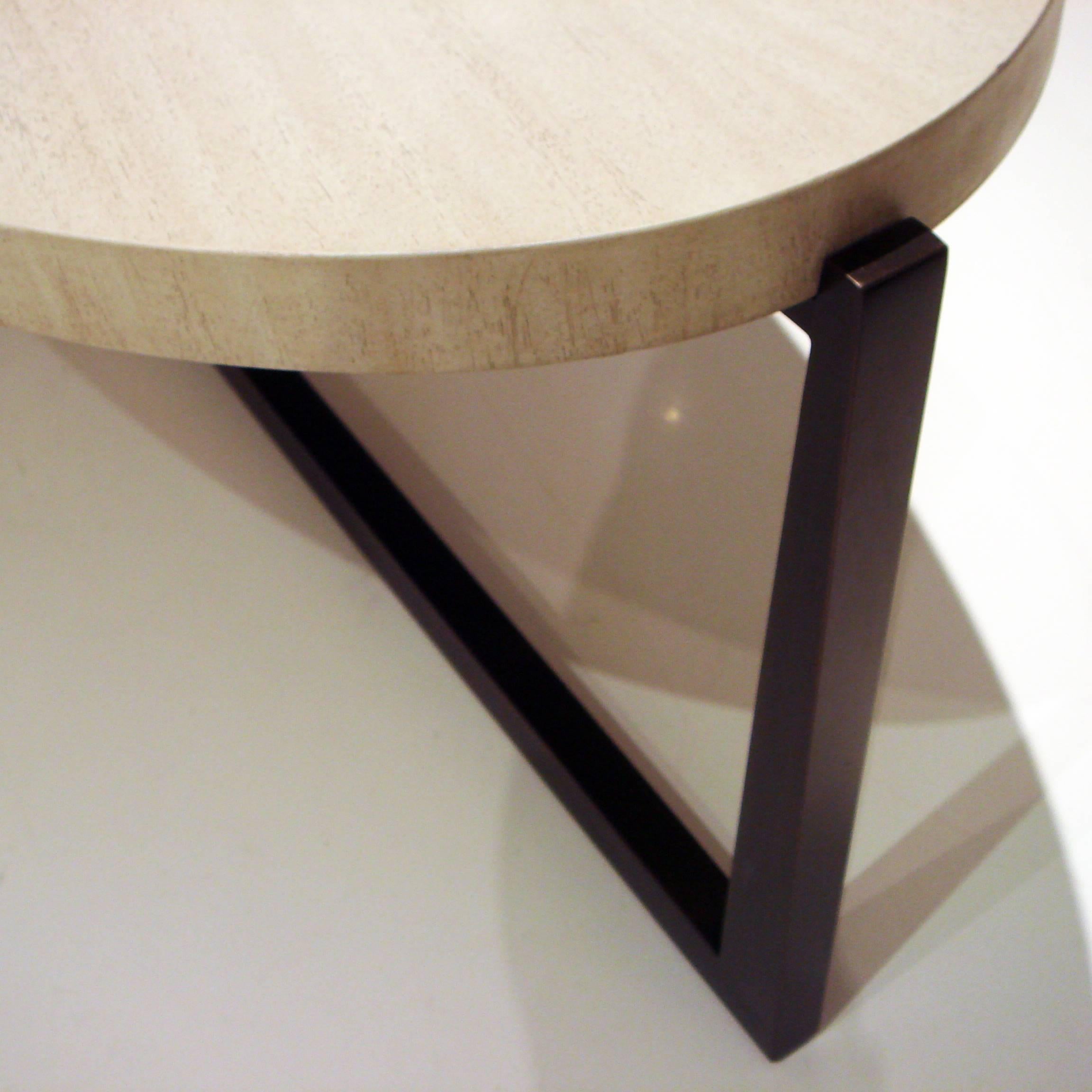 Elliptical oval coffee table designed by Albert Limshue with reverse tapered steel base and standard wood top.
 