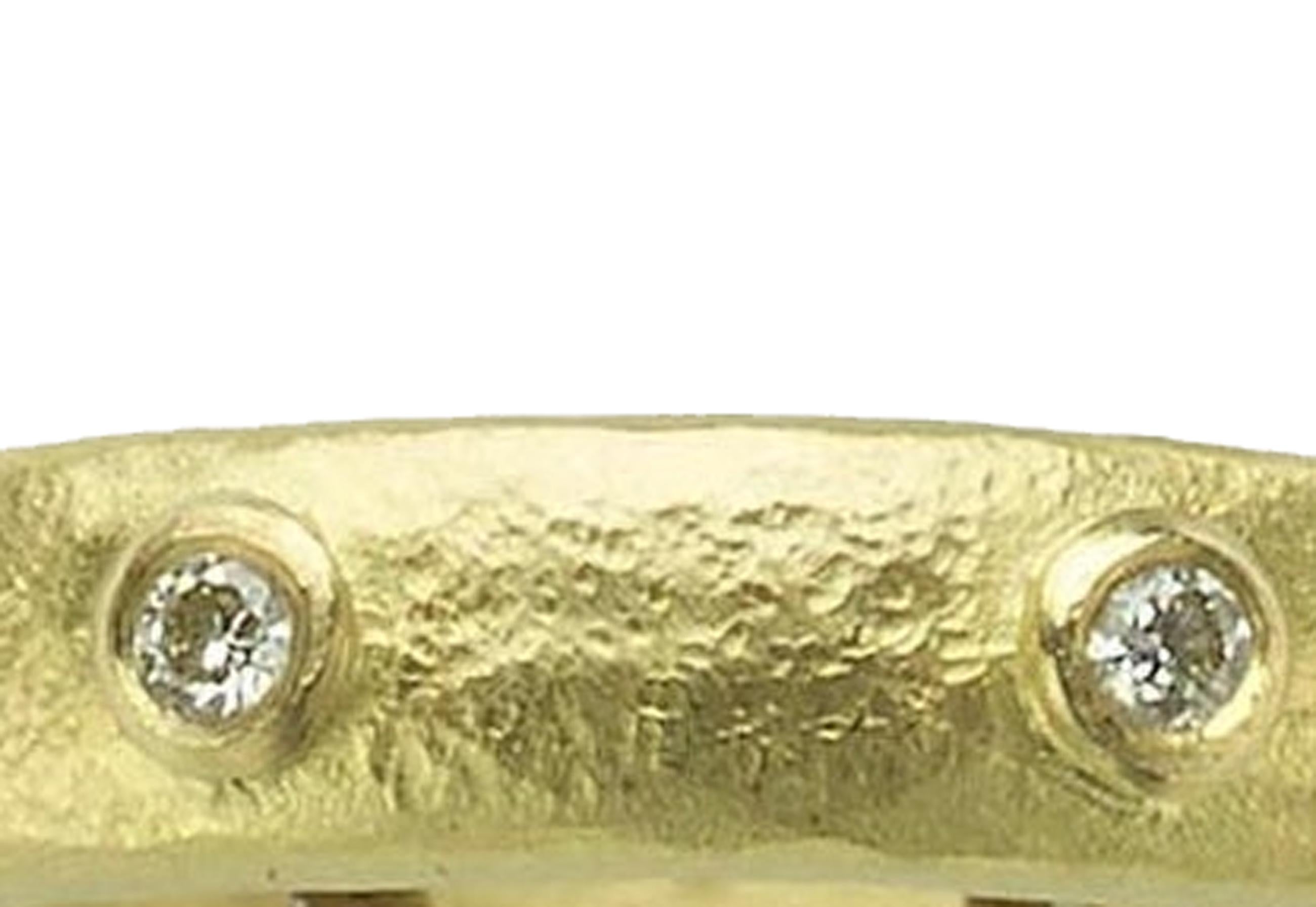 Elegant and understated 18ct yellow gold ring, with beaten texture finish, set with eight diamonds. This ring has been made by hand by Julia Lloyd George in her London studio. Ring size: N 1/2 (UK ring size)
