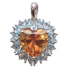 Beating Heart Pendant, Yellow Heart Sapphire 
Marquise Blue Spinels, Silver