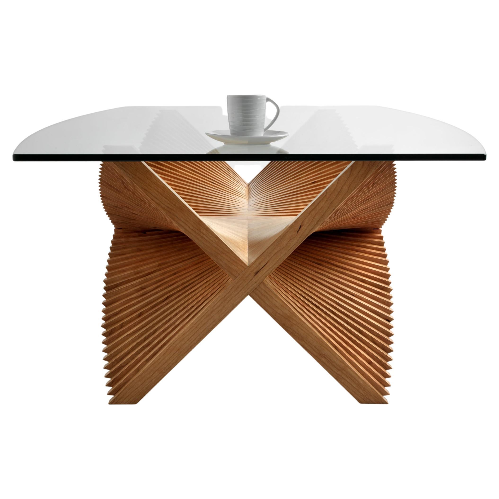 Beating Wings, marked a conscious move into a more sculptural line of work, fusing geometry with organic forms. This limited edition coffee table was the first piece in the Strata series, which is based on using multiple layers to create a sense of