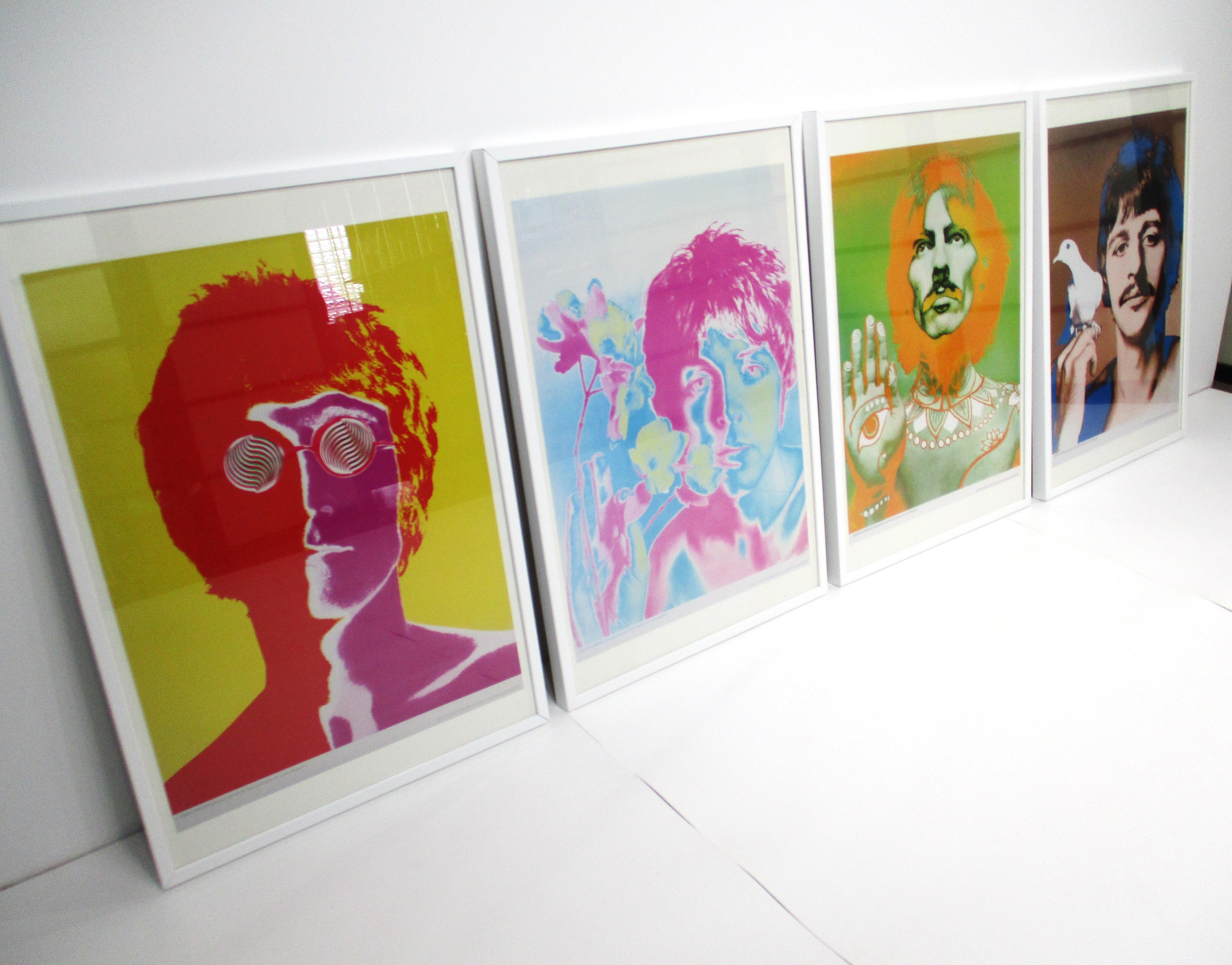A set of four off set lithograph posters of the Beatles taken by the iconic photographer Richard Avedon . Taken in the period 1967 at the height of the fab fours career the pictures were printed in Look magazine they also could be ordered by the