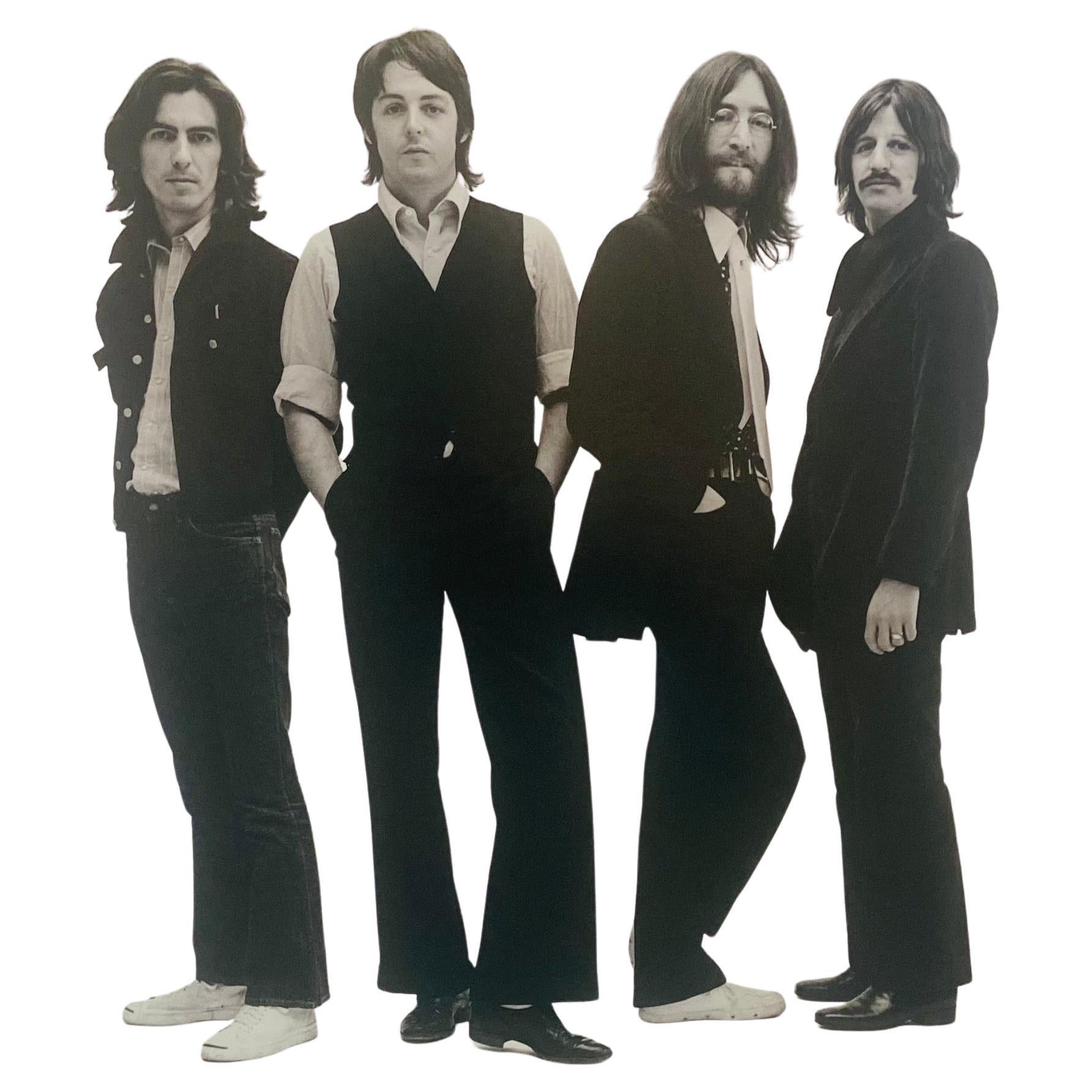 A large black and white photography of the legendary rock band 