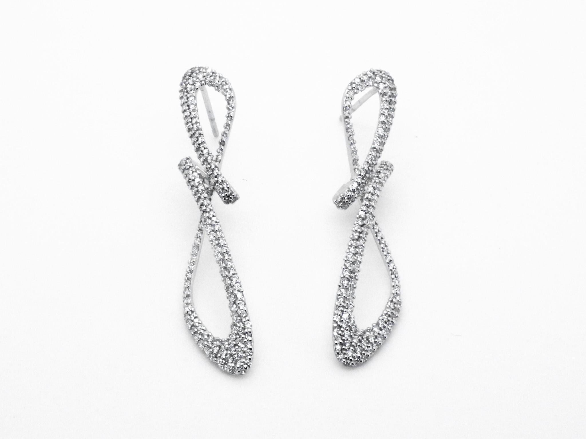 Modern 18k White Gold Diamond Pave Delicate Cosmic Empowering Shape-shifting Earrings For Sale