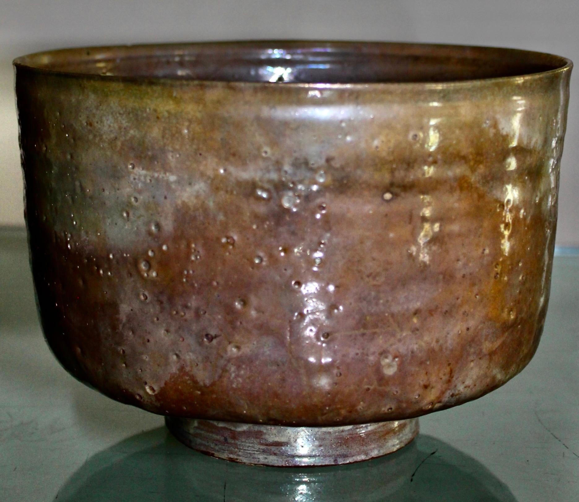 A beautiful glazed and very thin walled bowl. Signed on bottom.