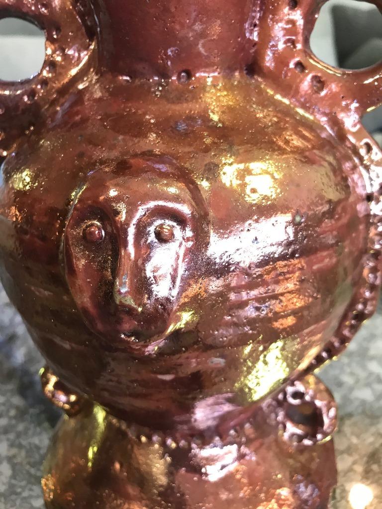 An exceptionally rare and fine late piece by famed American ceramist Beatrice Wood featuring her copper luster glaze. This work was made very late in her pottery career (she was over 100 years old) and is known as a 