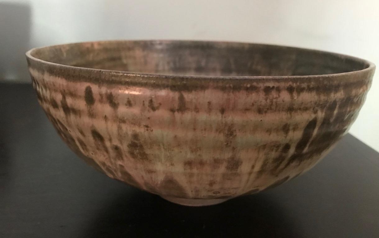 Wonderfully dripped glazed thin-walled (learned no doubt from her time with the Natzlers) bowl by master potter Beatrice wood.

Signed by the artist on the underside of the base.

Would be an amazing addition to any collection and sure to stand