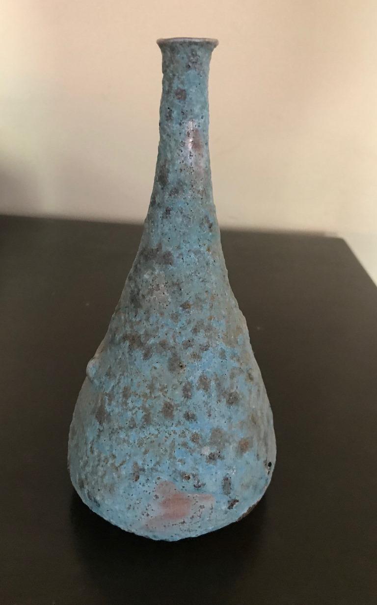 A wonderful piece by famed American ceramist Beatrice Wood featuring her highly coveted blue lava glaze. 

Signed by Wood on underside of base. 

Would be an amazing addition to any collection and sure to stand out.

Know famously in the arts