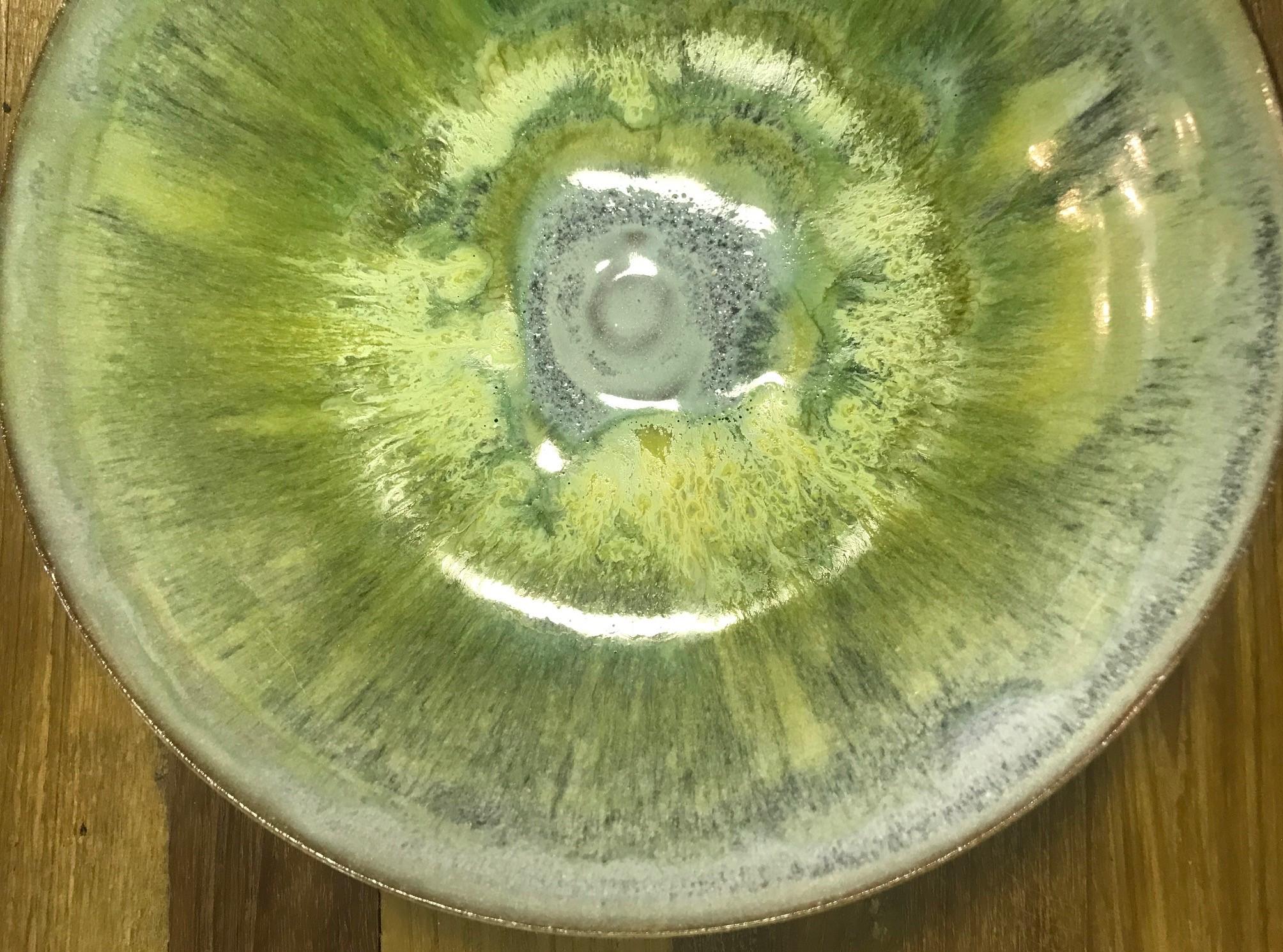 A wonderfully layered and glazed bowl by famed American ceramist Beatrice Wood. Beautifully textured. The bowl glows in the light. We have not seen another quite like it.

Signed by Wood on underside.

Would be an amazing addition to any