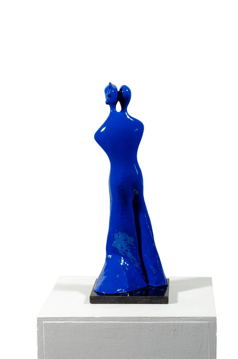 Soulmates #1 S (in blue) is a contemporary bronze sculpture by Beatriz Gerenstein where the artist establish a dialog about the deep mysteries of love. The couple is in love; they became one flesh, one skin, one soul. Their two souls complement one