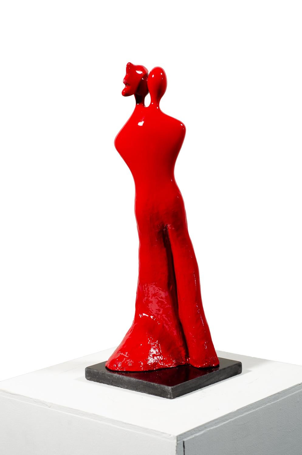 Soulmates #1 (in red) is a contemporary bronze sculpture by Beatriz Gerenstein where the artist establish a dialog about the deep mysteries of love. The couple is in love; they became one flesh, one skin, one soul. Their two souls complement one to