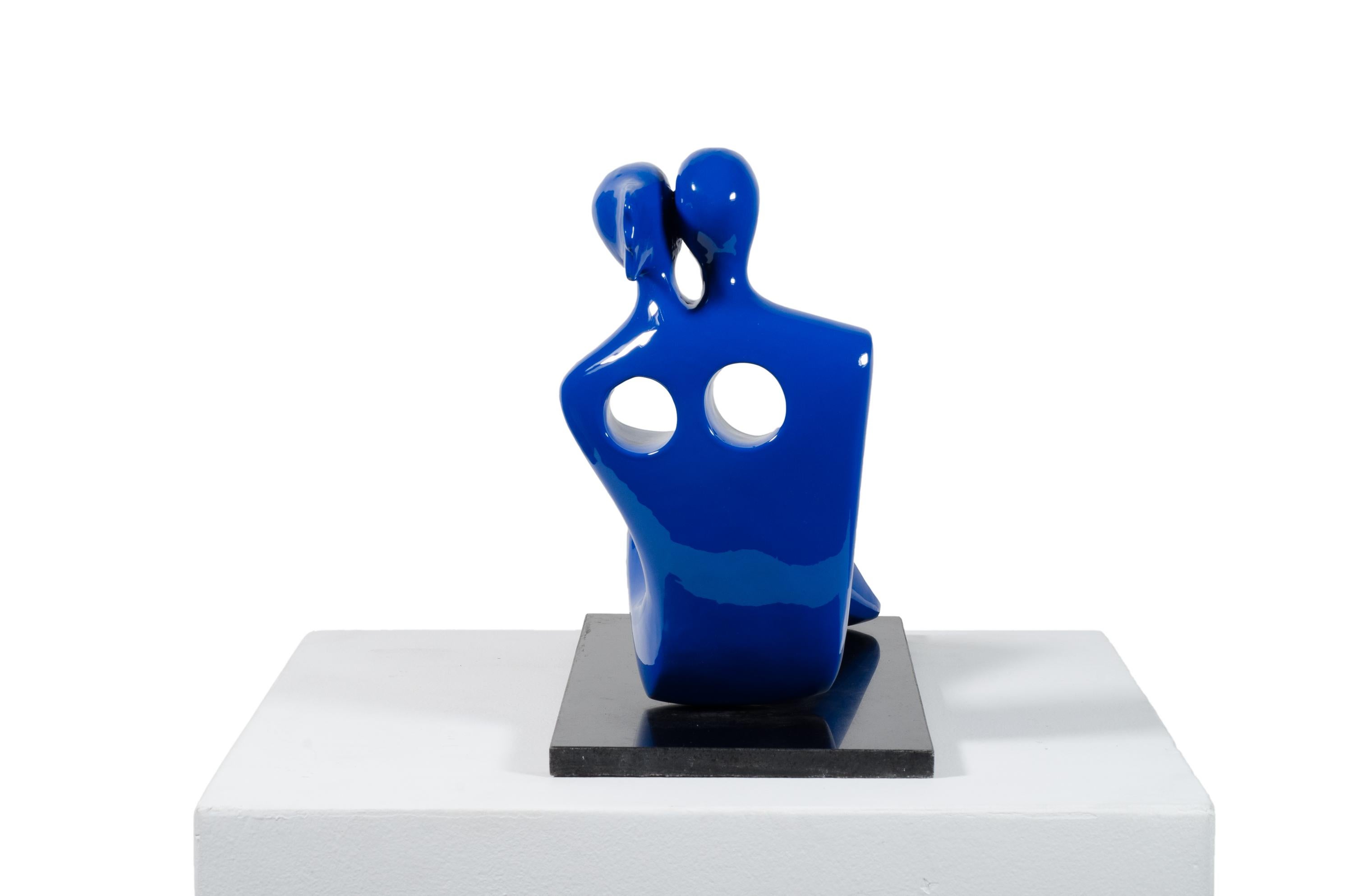When in love, their souls and bodies fuse into just one. Soul Mates #3 (in blue) is a contemporary bronze sculpture by Beatriz Gerenstein where the artist establishes a dialog about the deep mysteries of love. The couple is in love; they became one