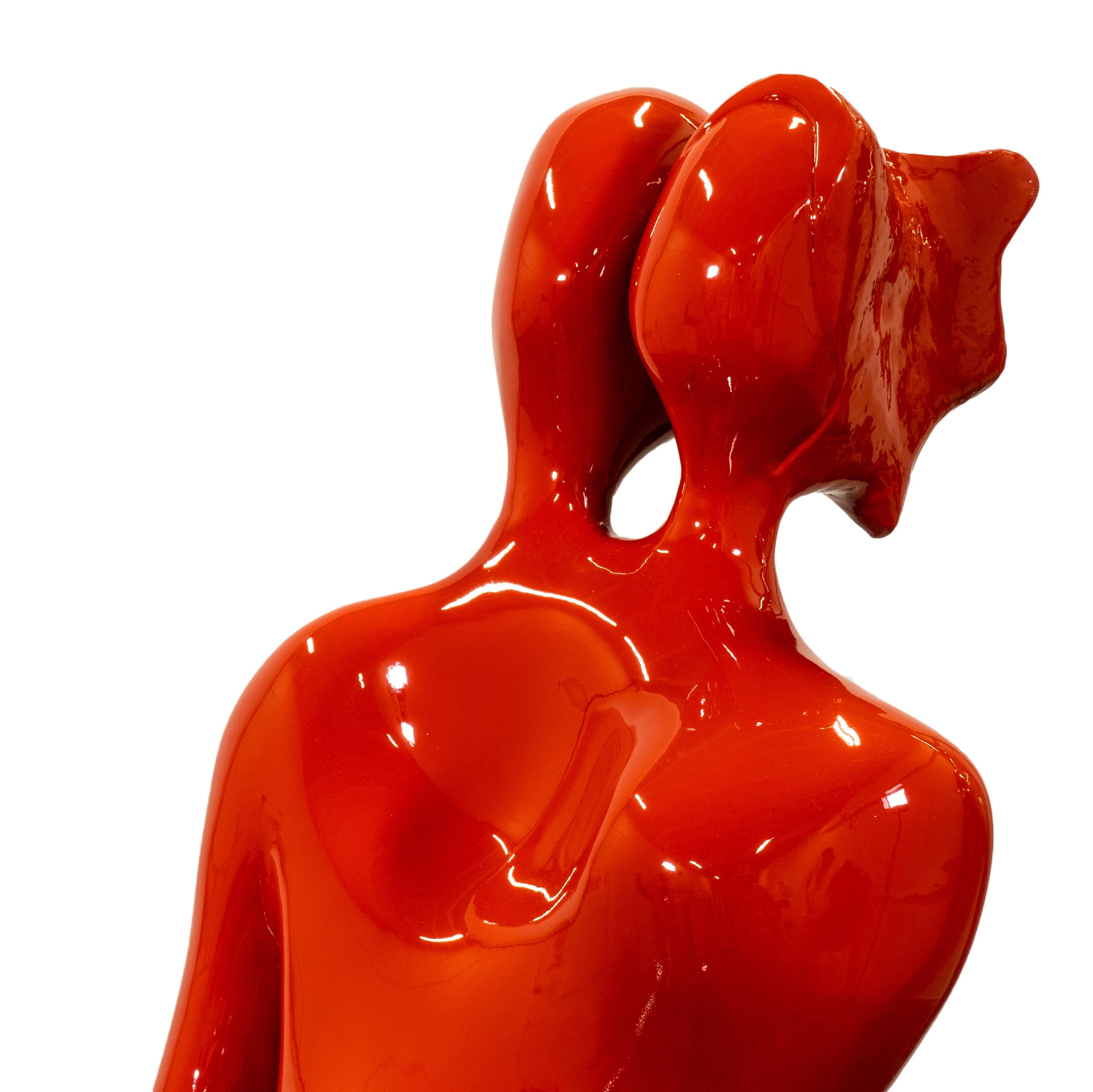 Beatriz Gerenstein exhibited “Soulmates II” in the museum “La Quadreria, in Bologna, Italy, in 2020.
The artist plays with the deep mysteries of love. This sculpture shows two human figures fused into one body. 
The bright, shiny red patina clearly