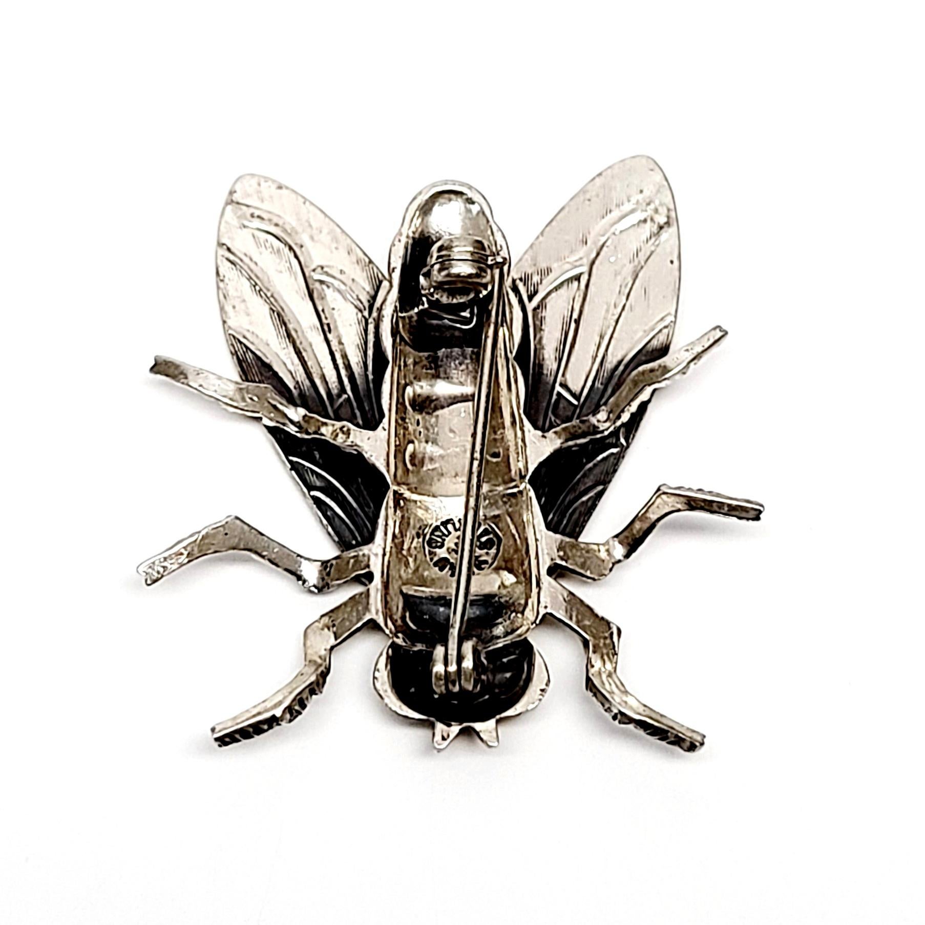 Vintage Beau sterling silver fly pin.

Beau and Beaucraft jewelry began in Providence, RI in 1947, they produced beautiful and unique fine silver pieces for over 50 years. This piece is a nice example of Beau's uniqueness, a highly detailed large