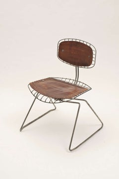 Silla Beaubourg de acero y piel de Michel Cadestin y Georges Laurent