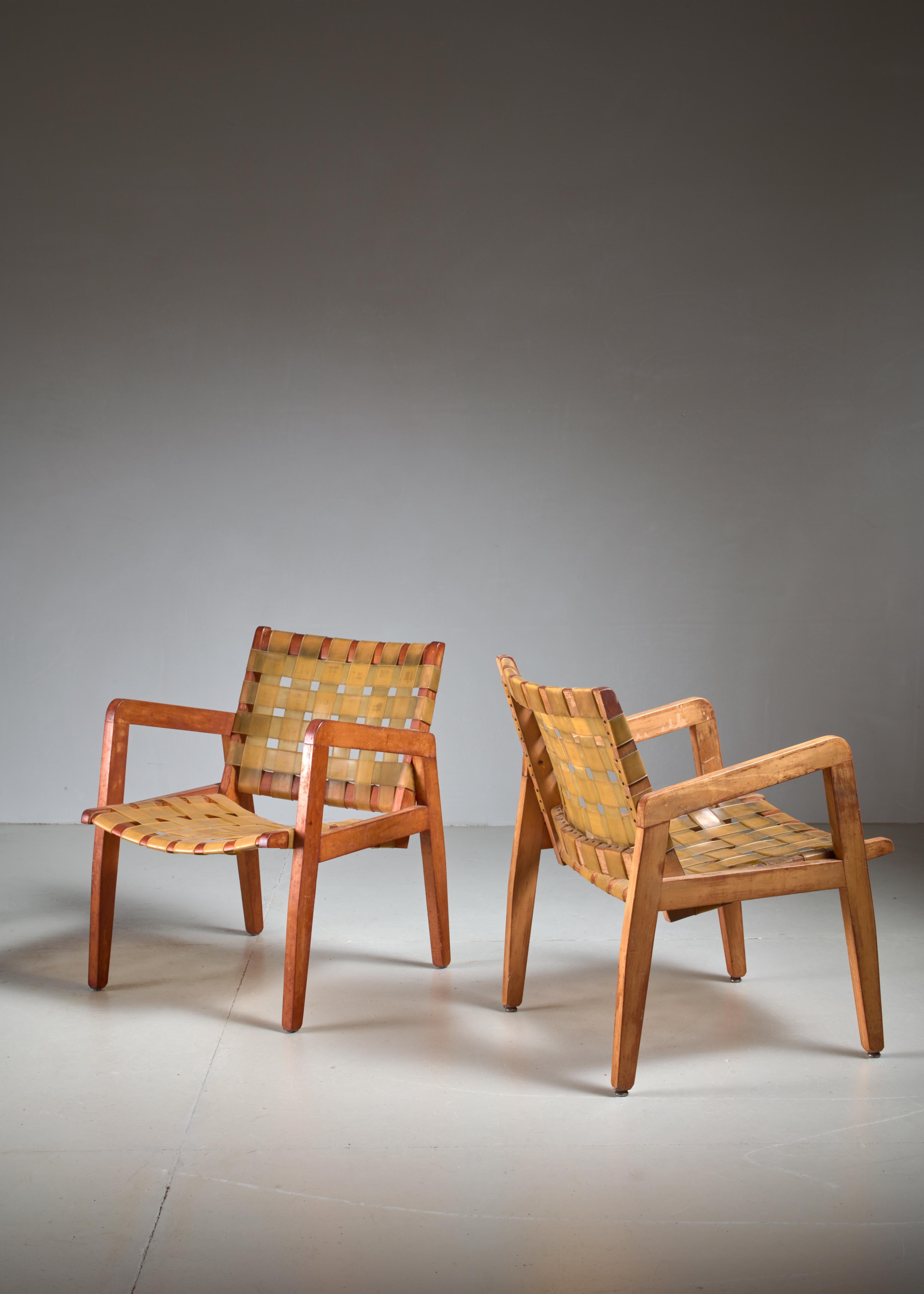 A pair of armchairs by the Beauchemin Brothers. The chairs are made of wood and a yellow plastic webbing. The chairs are in a very good vintage condition and fully original.

One of the chairs is marked 'Beauchemin Bros.'
The company was founded
