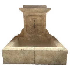 Beaulieu Hand-Carved Limestone Wall Fountain, Iron Spout