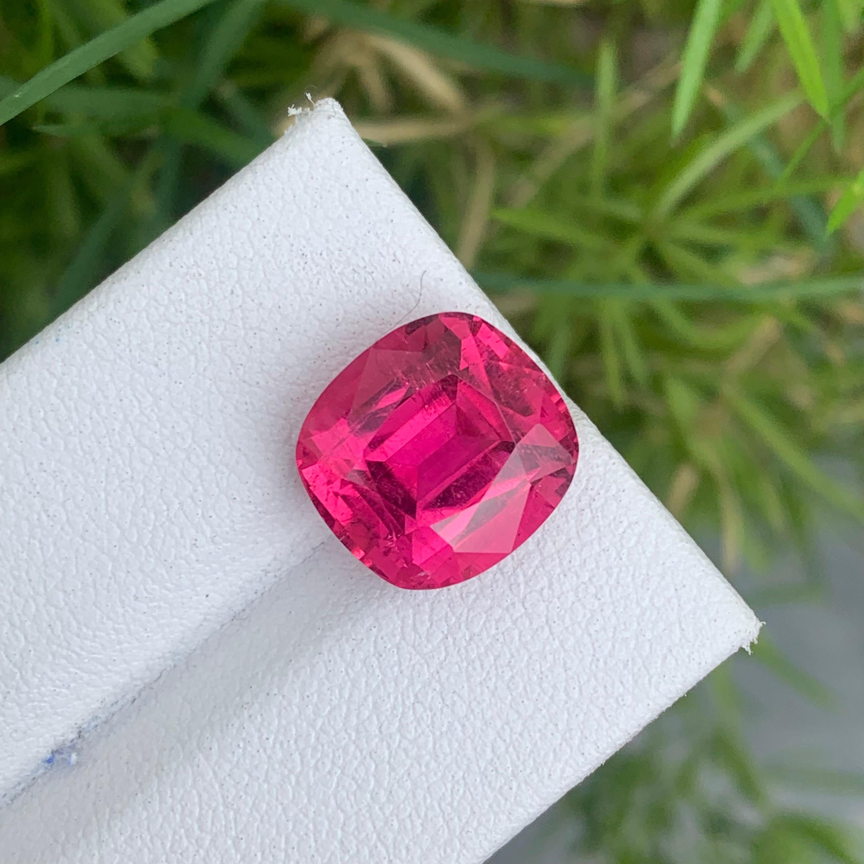 Gemstone Type :  Rubellite Tourmaline
Weight : 7.45 Carats
Dimensions : 12.1x11.4x7.8 Mm
Origin : Afghanistan
Clarity :  SI
Shape: Cushion
Color: Hot Pink
Certificate: On Demand
Rubellites are tourmalines with reasonably saturated dark pink to red