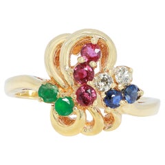 Magnifique bague en or jaune 18 carats avec rubis, saphir, émeraude et diamants de 0,45 carat