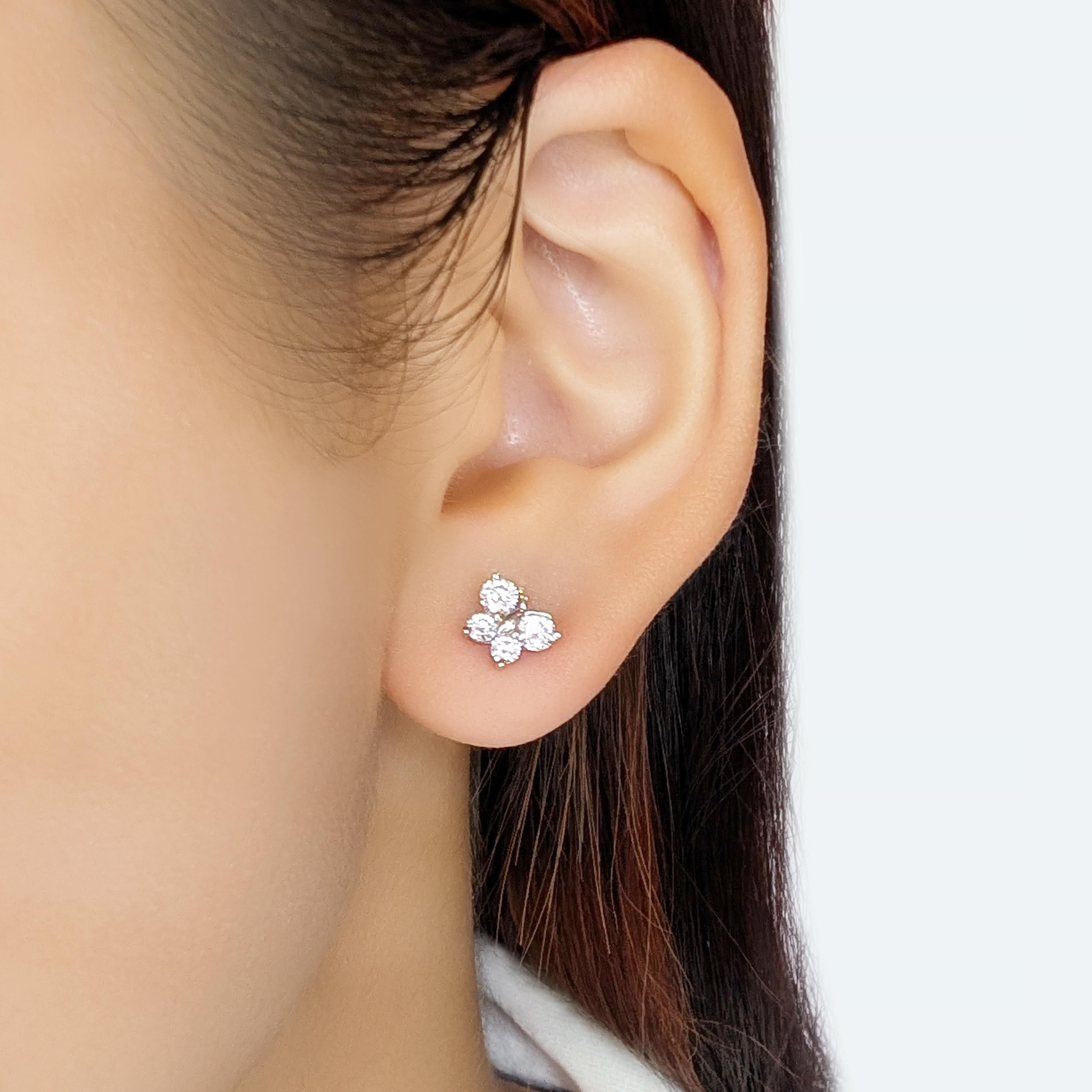 Experience timeless beauty with these exceptional earrings by Gold Heart. Crafted with meticulous attention to detail, they feature 8 natural round brilliant diamonds of impeccable D-E color and VVS-VS clarity. The dazzling 0.60ct stones are set in