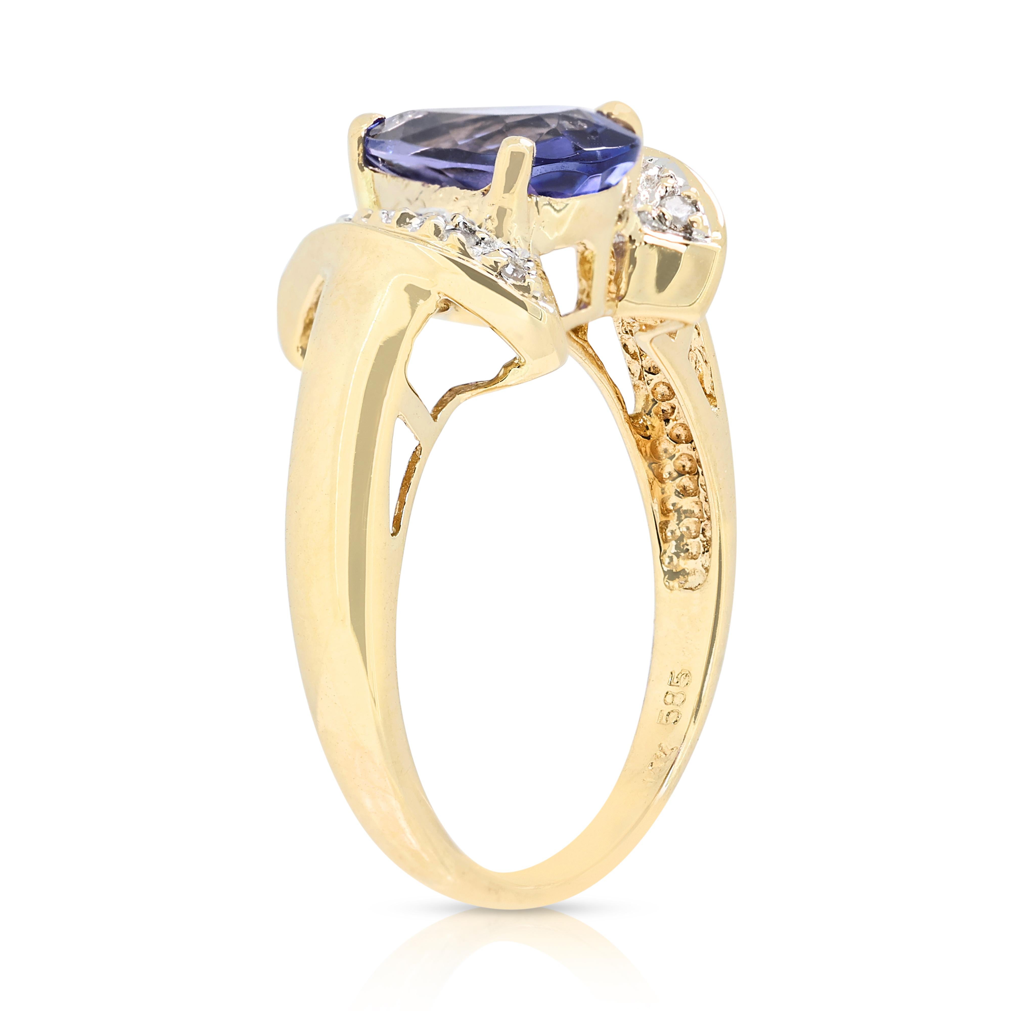 Magnifique bague grappe de tanzanites et de diamants de 0,71 carat en or jaune 14 carats 1