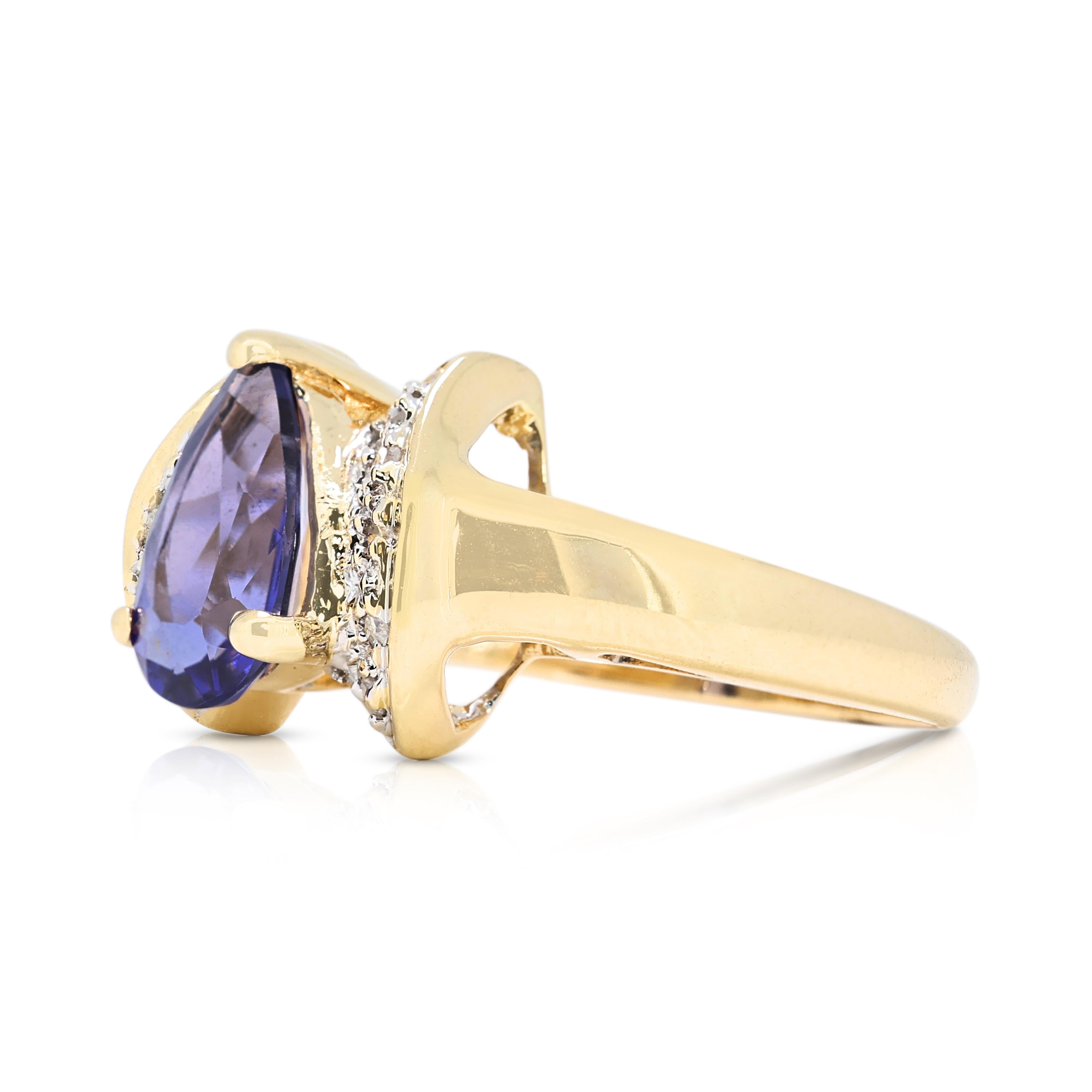 Magnifique bague grappe de tanzanites et de diamants de 0,71 carat en or jaune 14 carats Excellent état à רמת גן, IL