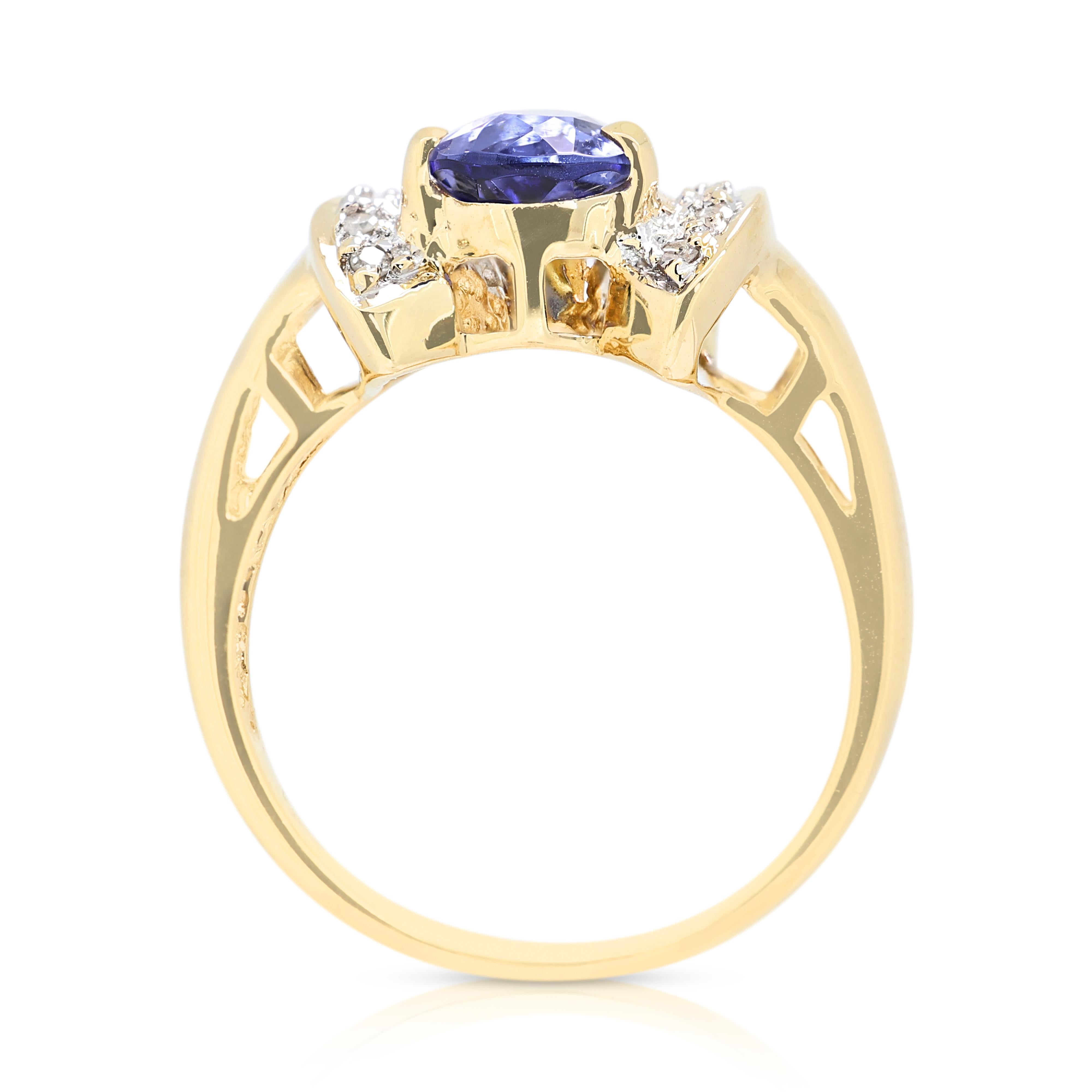 Magnifique bague grappe de tanzanites et de diamants de 0,71 carat en or jaune 14 carats 2