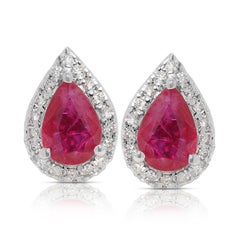 Beautiful 1 carat & 30 points Ruby and Diamond Halo Earrings in 18K White Gold