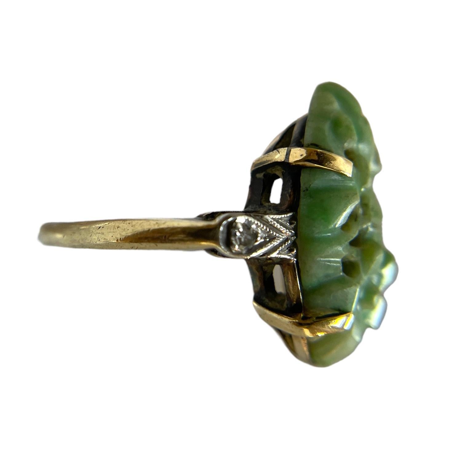 Modern Beautiful 10K H. Rosenthal Carved Jade Ring For Sale
