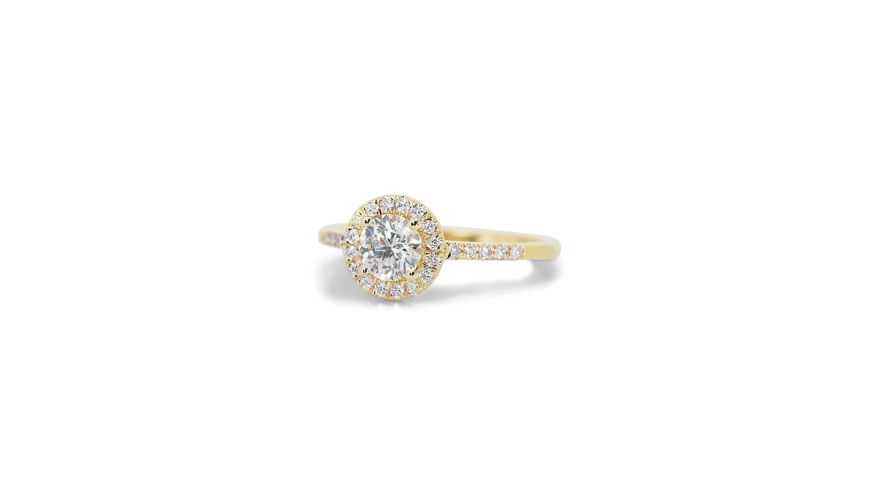 Beautiful 1.27ct Triple Excellent Ideal Cut Diamonds Halo Ring in 18k Yellow Gold - GIA Certified

Elevate your style with this captivating 18k yellow gold diamond halo ring.  At its center lies a stunning 1.07-carat round diamond, boasting a triple