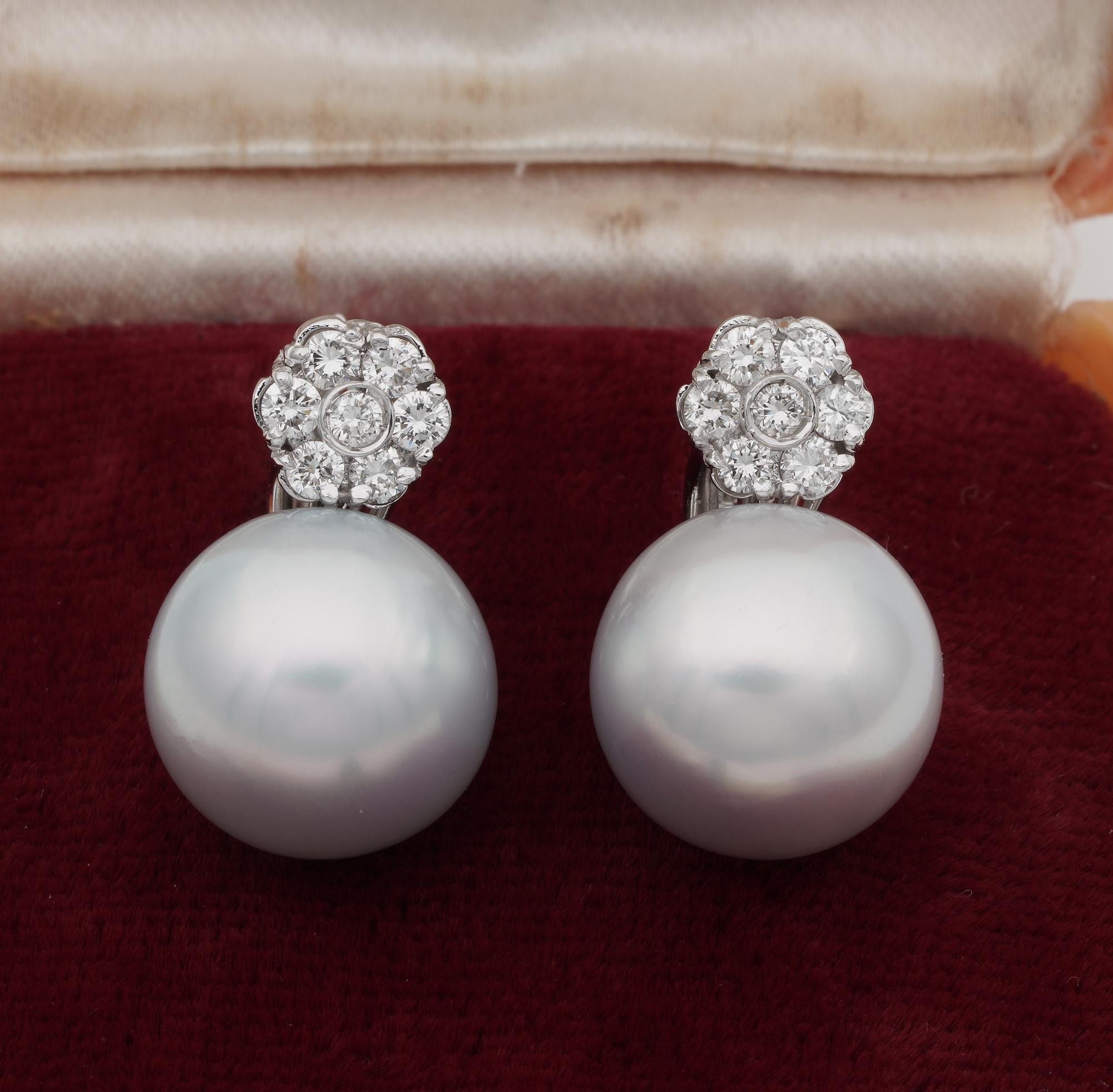 Superb!

Essential classy style for formal or informal look, beautifully designed vintage earrings, 1980 ca
Solidly constructed of solid 18 KT white gold to stand on as statement earrings for you as show off at any occasion
Large jumbo size South