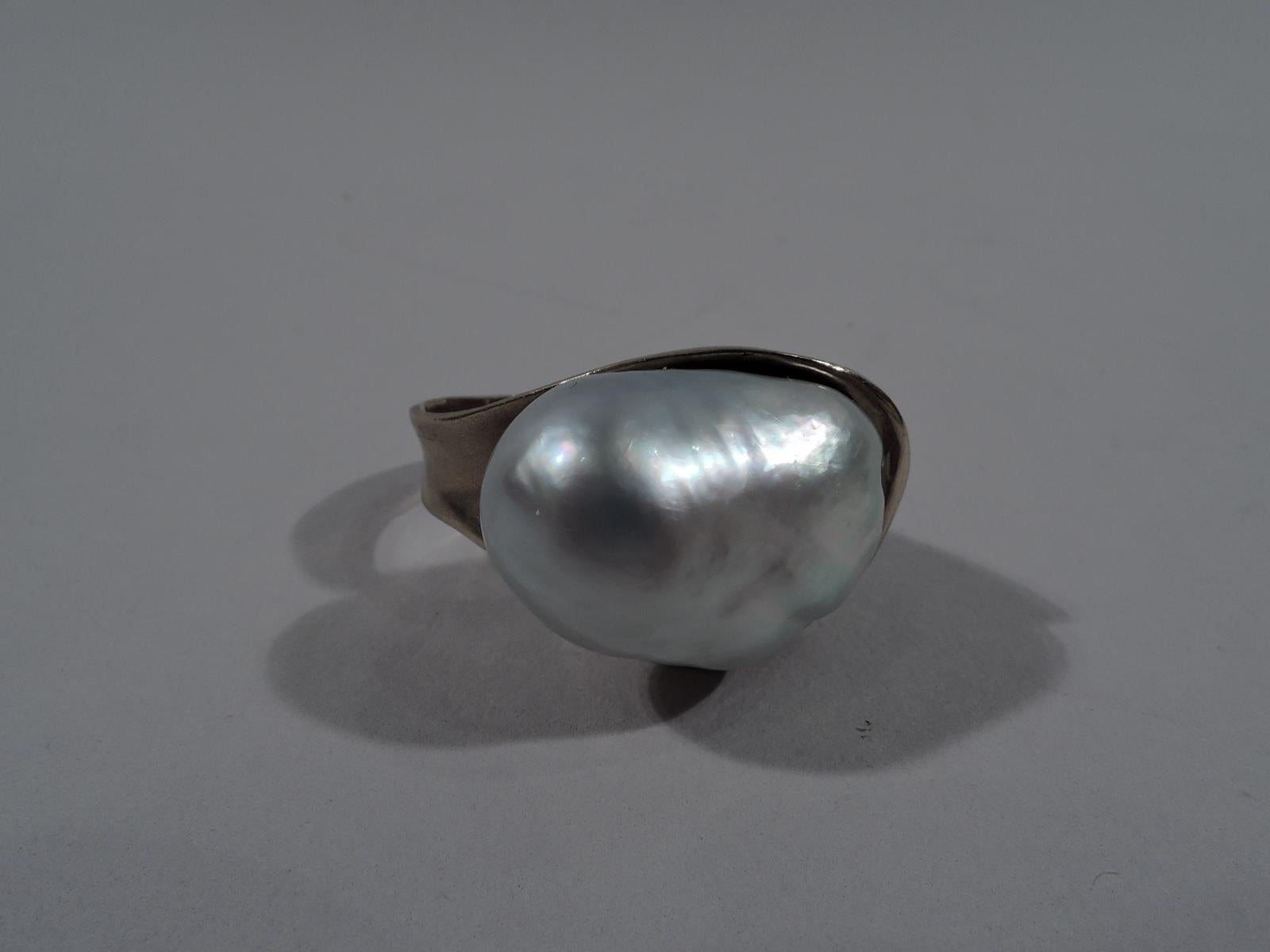 Beautifully hand-crafted ring by Takashi Wada, ca 1960. Tooled 14k gold and South Sea pearl in open mount. Signed and marked. Size: 9.5.  