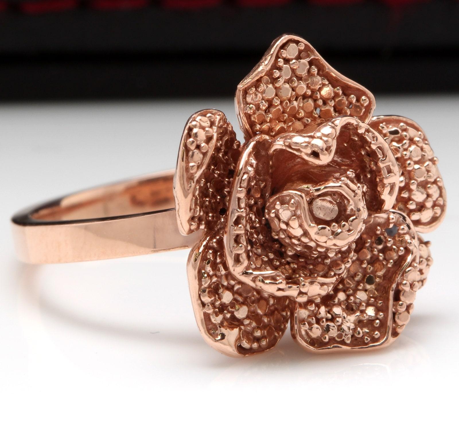 Beautiful 14K Solid Rose Gold Flower Ring

Suggested Replacement Value: $1,300.00

Stamped: 14K

Flower Measures: 16.60 x 16.25mm

Ring size: 6.5 (free sizing available)

Item total weight: 6.1 grams

Disclaimer: all weights, measurements and colors