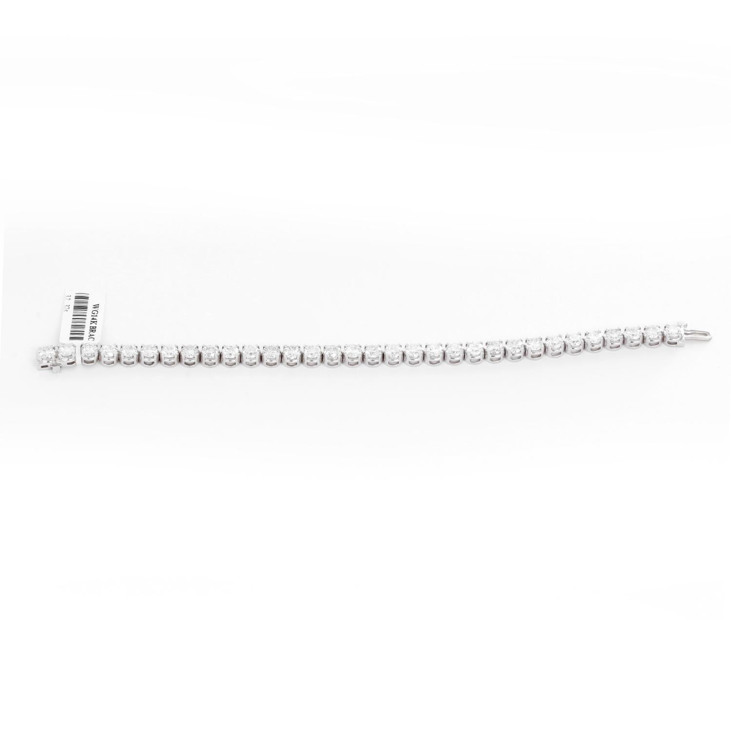 Beautiful 14 Karat White Gold and 11.69 Carat Diamond Tennis Bracelet In New Condition In Dallas, TX