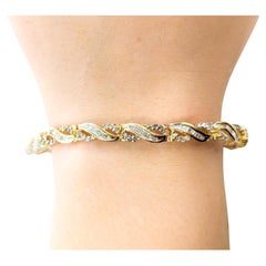 Schönes Armband aus 14 Karat Gelbgold mit Diamanten