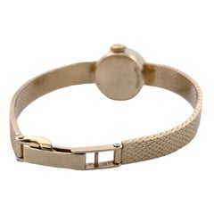 Beautiful 14K Yellow Gold Rolex Ladies Watch With Snake Skin Design Band