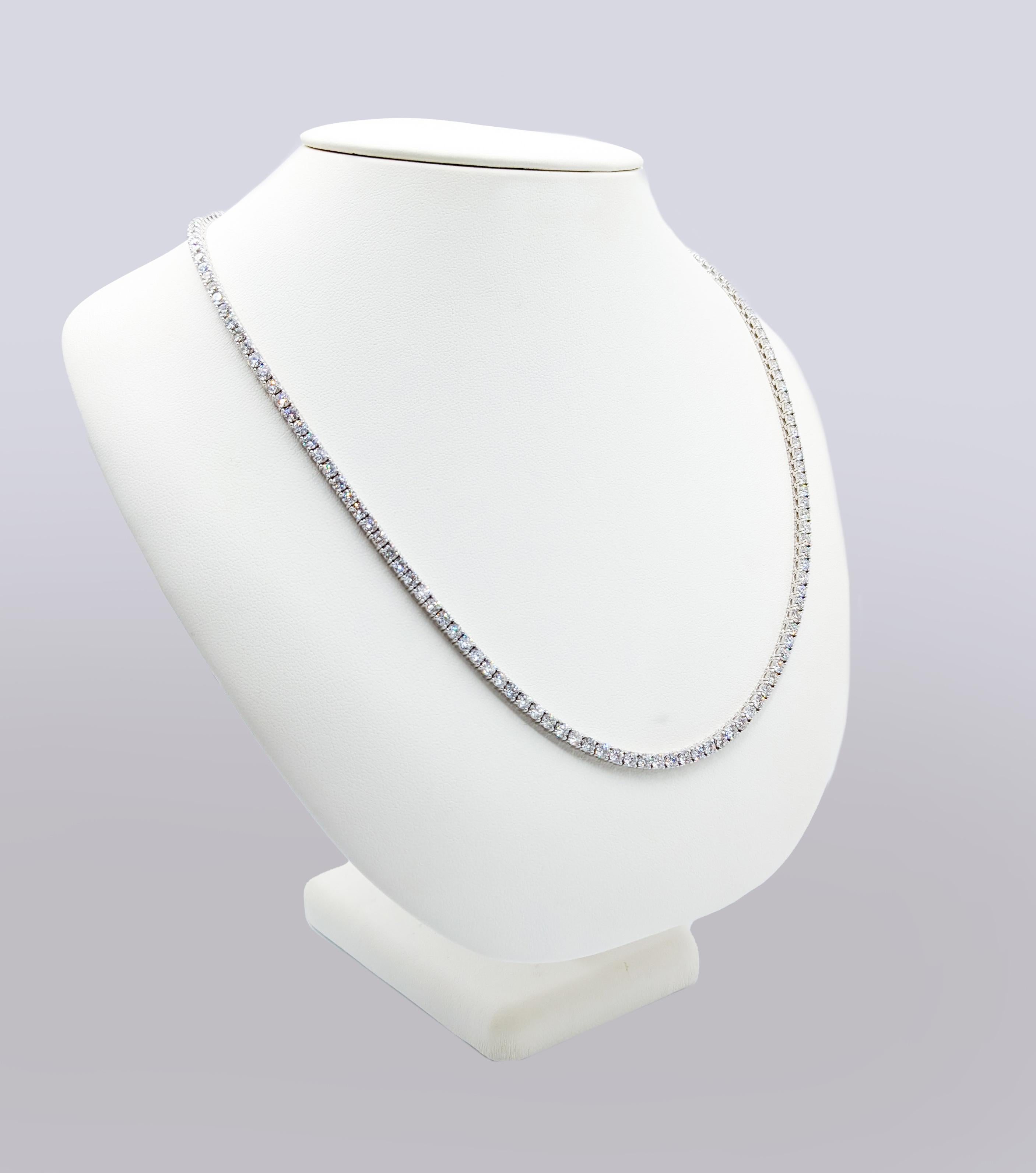 Beautiful 16.88ctw Natural Diamond Tennis Necklace in 14Kt White Gold

This beautiful tennis necklace is meticulously crafted from 14kt white gold. It proudly showcases a continuous line of radiant diamonds totaling 16.88ctw. Each diamond sparkles